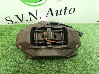 Суппорт передний левый 7L6