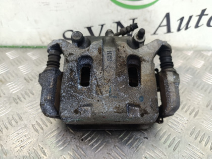 Суппорт передний левый KY51