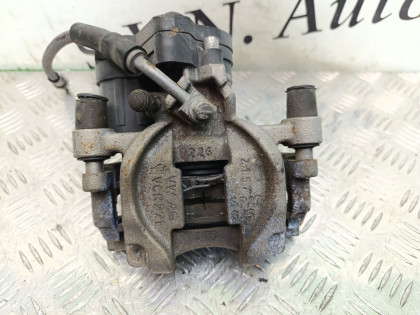 Суппорт задний правый 8VCXS