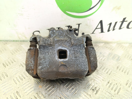 Суппорт передний левый TNJ31