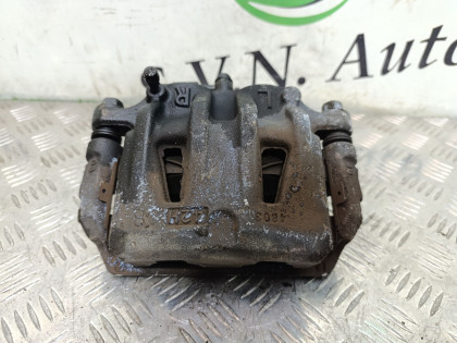 Суппорт передний правый PE52