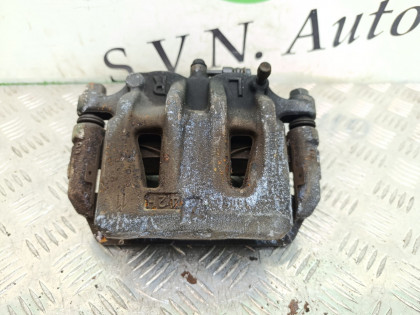 Суппорт передний левый PE52