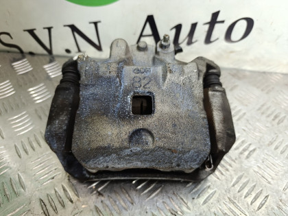 Суппорт передний левый TB17