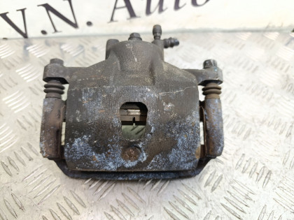 Суппорт передний левый KG11