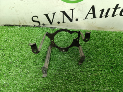 Кронштейн противотуманной фары левый T30