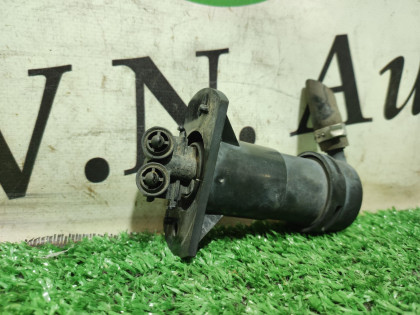 Форсунка омывателя фары правая 4FBDX