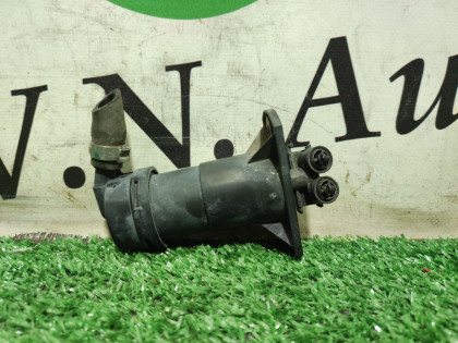 Форсунка омывателя фары левая 4FBDX