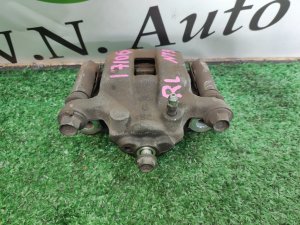 Суппорт тормозной задний левый NISSAN X-TRAIL