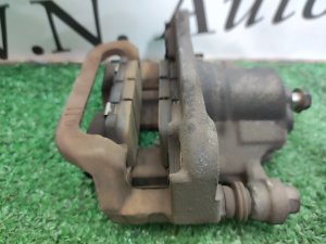 Суппорт тормозной задний левый NISSAN X-TRAIL DNT31 2010