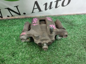 Суппорт тормозной задний левый NISSAN X-TRAIL