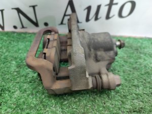 Суппорт тормозной задний левый NISSAN X-TRAIL DNT31 2010