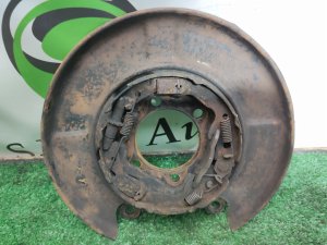 Щиток тормозного диска задний левый NISSAN X-TRAIL