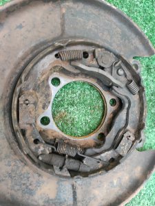 Щиток тормозного диска задний левый NISSAN X-TRAIL DNT31 2010