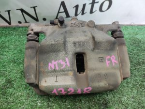 Суппорт передний правый NISSAN X-TRAIL