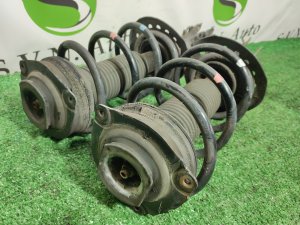 Стойка передняя (пара) NISSAN X-TRAIL OEM E4302JG71A, E4303JG71A DNT31 2010